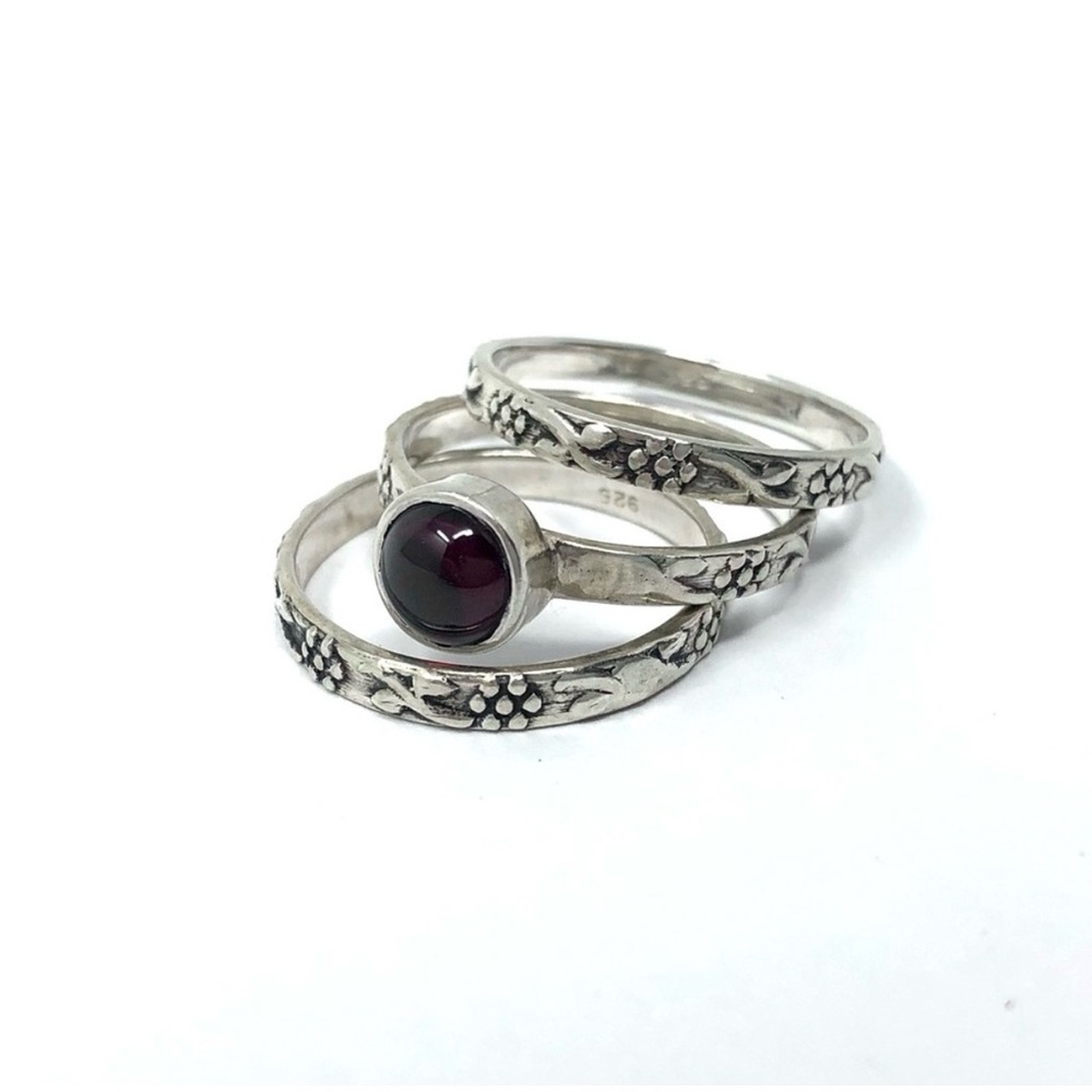Sterling silver and garnet three-ring stacking set - size 7.5